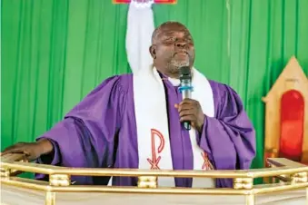  ?? EZEKIEL IBRAHIM MAISAMARI/UM NEWS VIA AP ?? Bishop John Wesley Yohanna of the United Methodist Church delivers a message to church members Dec. 10 at the church’s headquarte­rs in Jalingo, Nigeria.