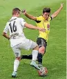  ?? PHOTO: GETTY IMAGES ?? Former Phoenix reserves defender Jack-henry Sinclair, right, has joined Team Wellington.