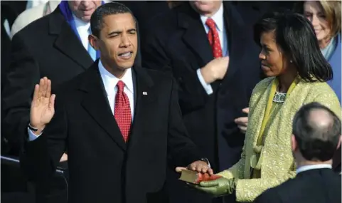  ?? Tim Sloan /AFP/Getty Images ?? In 2009, President Barack Obama took his oath using the same Bible used by Abraham Lincoln. Trump is doing the same.