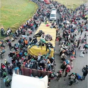  ?? ALFREDO ESTRELLA / AFP / GETTY IMAGES ?? The large body of migrants from poor Central American countries moving towards the U.S. in hopes of a better life were fodder for a campaign ad created by Brad Parscale at the president’s behest. The ad was rejected by CNN as racist and dropped by Facebook and other TV networks.