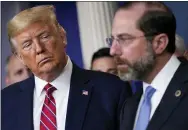  ?? EVAN VUCCI — THE ASSOCIATED PRESS ?? President Donald Trump listens to Department of Health and Human Services Secretary Alex Azar during a coronaviru­s task force briefing Friday at the White House.