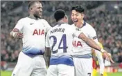  ?? REUTERS ?? Tottenham's Son Heung-min (right) celebrates their first goal against Dortmund with Serge Aurier and Moussa Sissoko.