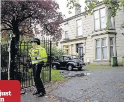  ??  ?? FAMILY HOME Police officer outside property where girl died