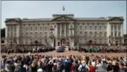  ?? FRANK AUGSTEIN — THE ASSOCIATED PRESS FILE ?? Queen Elizabeth II leaves Buckingham Palace with Prince Charles to travel to parliament for her speech at the official State Opening of Parliament in London.