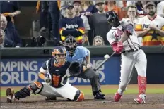  ?? ?? ◆ World Series MVP Jorge Soler hits a three-run home run during the third inning.