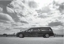  ?? AAron Ontiveroz, The Denver Post ?? A hearse carrying Officer Eric Talley drives along Interstate 270 on Wednesday. He was the first Boulder officer killed in the line of duty since 1994.