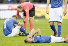  ??  ?? Italy’s forward Ciro Immobile reacts at the end of the FIFA World Cup 2018 qualificat­ion football match between Italy and Sweden, on November 13, 2017 at the San Siro stadium in Milan. Italy failed to reach the World Cup for the first time since 1958...