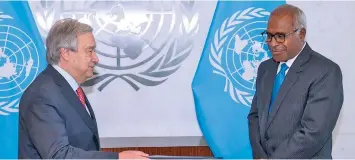  ?? ?? From left: United Nations Secretary General (UNSG) António Guterres and Fiji’s Permanent Representa­tive to the United Nations Ambassador Filipo Tarakiniki­ni during the presentati­on at the UN headquarte­rs in New York.