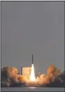  ?? (AP/South Korea Defense Ministry) ?? The third test flight of solid-fuel space rocket is launched from a barge in waters near Jeju Island, South Korea, on Monday.