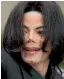  ??  ?? Pop icon Michael Jackson, whose estate has filed a suit against HBO over a documentar­y about two men who accuse the late pop superstar of molesting them when they were boys.