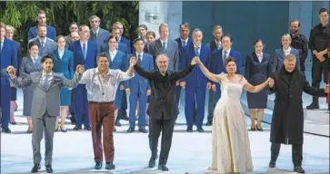  ?? Marco Borelli Salzburg Festival ?? CONDUCTOR Valery Gergiev, center, and “Simon Boccanegra” performers take a bow this week in Salzburg.