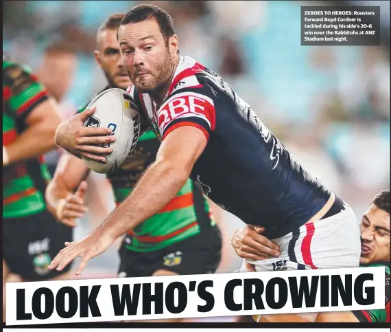  ??  ?? ZEROES TO HEROES: Roosters forward Boyd Cordner is tackled during his side’s 20- 6 win over the Rabbitohs at ANZ Stadium last night.