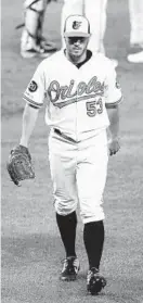  ?? NICK WASS/AP ?? Orioles starting pitcher Ty Blach walks to the dugout after he was pulled in the third inning of the team’s 7-3 loss to the Dodgers Tuesday night in Baltimore.