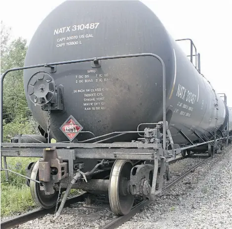  ?? Marie- France Coallier/ Postmedia News ?? Measures designed to make moving crude by rail safer will be neither easy nor cheap, Transport Minister Lisa Raitt says.