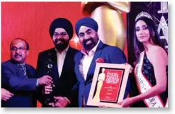  ??  ?? The award was given to TravelBull­z and, received by Amit Paul Singh, General Manager Sales and Kanwer Deep Singh, Founder &amp; President