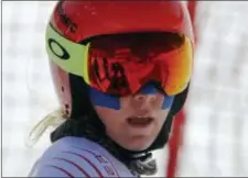  ?? MICHAEL PROBST — THE ASSOCIATED PRESS ?? Mikaela Shiffrin of the United States with her face covered in tape as protection from the cold during an inspection of the giant slalom course at the Yongpyong Alpine Center at the 2018 Winter Olympics in Pyeongchan­g, South Korea on Sunday.