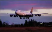  ?? JENNIFER BUCHANAN — THE SEATTLE TIMES VIA AP ?? The last Boeing 747lands at Paine Field in Everett, Wash., on Jan. 10.