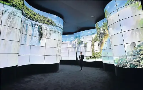  ?? Picture: Getty Images ?? LG’s exhibit at the Consumer Electronic­s Show in Las Vegas this week featured a spectacula­r canyon of TV panels that combined to give visitors the illusion of walking through natural scenery.