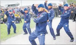  ??  ?? Player of the Tournament and Hastings West captain Monte Timu performs a haka with team mates after sharing the Ross Shield with Napier.