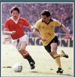  ??  ?? BAD DAY Thomas battles Liam Brady during the 1979 FA Cup final which Arsenal won 3-2