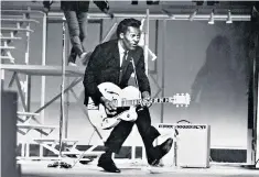  ??  ?? Performing his distinctiv­e ‘duck walk’, on stage in Santa Monica, California in 1964