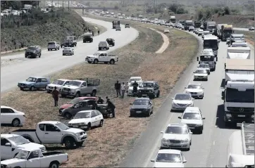  ??  ?? PROTESTING: Vehicles blockade a freeway between Joburg and Vereenigin­g in protest against farm murders. The writer says the protest should not have been racialised.