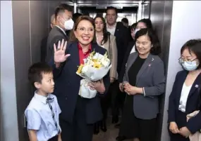  ?? Gao Feng/Xinhua via AP ?? Honduras' President Xiomara Castro waves as she arrives in Shanghai, China, Friday.