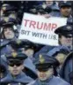  ?? PATRICK SEMANSKY — ASSOCIATED PRESS ?? An Army cadet displays a sign for then Presidente­lect Donald Trump in the first half of the 2016 Army-Navy game.