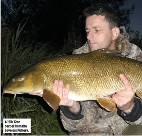  ??  ?? A 15lb 12oz barbel from the Severals Fishery.