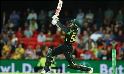  ?? Photograph: Chris Hyde/ Getty Images ?? Mitchell Starc hits out during Australia’s three-wicket victory in the first of two T20 matches against West Indies.