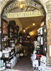  ?? Anne D’Innocenzio via AP ?? ■ The entrance to Cantina Ercolani, a family-run wine shop, is seen Sept. 11 in Montepulci­ano, Italy. The shop has an undergroun­d wine cellar stocked with wines from its winery.