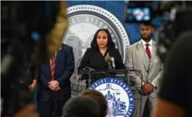  ?? KENNY HOLSTON/NEW YORK TIMES ?? Fani Willis (bottom right) leads the prosecutio­n.