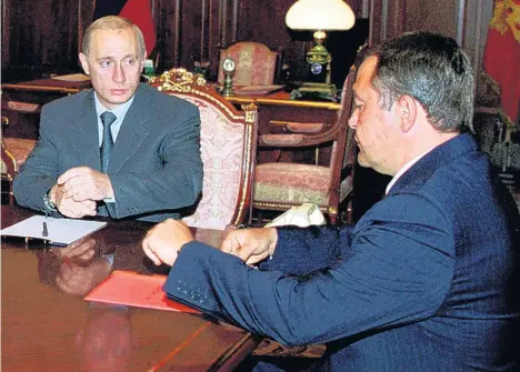 ?? REUTERS ?? Vladimir Putin with Russia Today founder Mikhail Lesin, who was said to be on good terms with the President, in 2000
