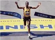  ?? Charles Krupa/Associated Press ?? Sisay Lemma, of Ethiopia, breaks the tape to win the Boston Marathon Monday in Boston.