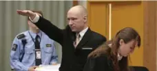  ?? LISE ASERUD/THE ASSOCIATED PRESS ?? Anders Behring Breivik gives a Nazi-style salute in court on Tuesday.