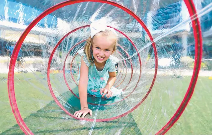  ?? Picture: RICHARD GOSLING ?? Katelyn Taylor, 6, has some fun at the summer camp at Robina Town Centre before returning to Bundaberg tomorrow.