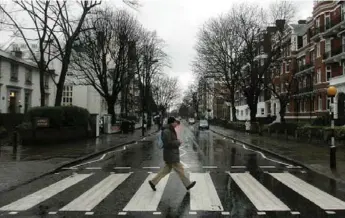  ?? AKIRA SUEMORI/THE ASSOCIATED PRESS FILE PHOTO ?? The zebra crossing in front of Abbey Road Studios, made famous on the cover of the Beatles’ Abbey Road album.