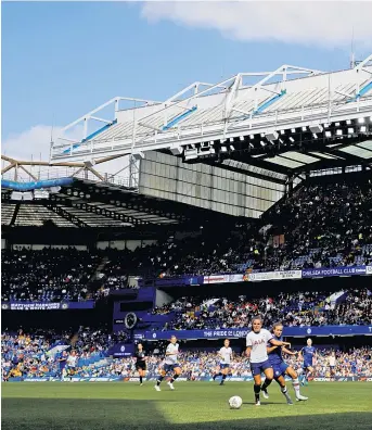  ??  ?? Breaking new ground: The scene at Stamford Bridge, where Chelsea Women drew their record attendance