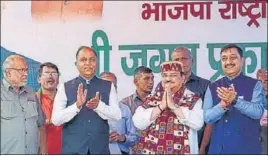  ?? PTI ?? BJP national president JP Nadda with Himachal Pradesh chief minister Jai Ram Thakur during a public rally in Kullu on Friday.