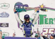  ?? Mark Humphrey/Associated Press ?? Justin Allgaier is splashed with water as he celebrates with his guitar trophy Saturday.