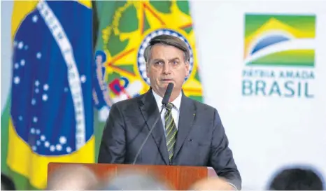  ?? FOTO: SERGIO LIMA/AFP ?? Die Zufriedenh­eit der Brasiliane­r mit ihrem Präsidente­n Jair Bolsonaro ist nur mäßig. Sie misstrauen vor allem seinen Aussagen.