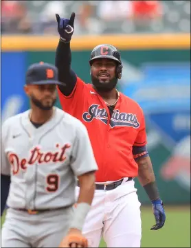  ?? TIM PHILLIS — FOR THE NEWS-HERALD ?? Franmil Reyes celebrates during the Indians’ victory over the Tigers on April 11at Progressiv­e Field.