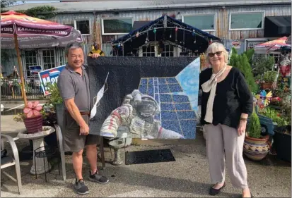  ?? PHOTOS COURTESY OF PATRICIA BRUVRY ?? Retired NASA astronaut Leroy Chiao and San Rafael resident Patricia Bruvry with her quilt of him.