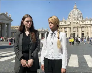  ?? NICOLE WINFIELD — THE ASSOCIATED PRESS ?? Yuliia Fedosiuk, left, and Kateryna Prokopenko, both from Ukraine, met with Pope Francis on Wednesday. They sought an evacuation of defenders of the Mariupol steel mill.