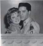  ??  ?? Juliet Prowse shares a clinch with Elvis Presley in the 1960 musical “G.I. Blues.”