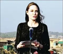  ??  ?? Angelina Jolie, a special envoy for the UN High Commission­er for Refugees (UNHCR), addresses a press conference after her visit to the Kutupalong camp for Rohingya refugees in Ukhia in southern Bangladesh on Tuesday.