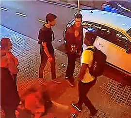  ?? ?? CCTV footage captures Levi Davis (with a backpack) leaving a bar in Barcelona. Levi played for Bath Rugby.