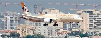  ?? AFP ?? An Etihad Airways plane carrying a delegation from the
UAE on a first official visit, lands at Israel’s Ben Gurion airport near Tel Aviv on Tuesday.