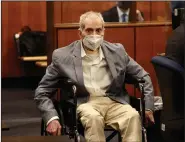  ?? (AP/Los Angeles Times/Al Seib) ?? Robert Durst spins his wheelchair in place Wednesday as he looks at people in the courtroom during an appearance in Inglewood, Calif.
