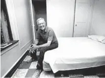  ?? ?? Jimmy Carter sits in the bedroom he’s staying in with his wife Rosalynn at the Guyon Hotel on Chicago’s West Side on July 9, 1986.